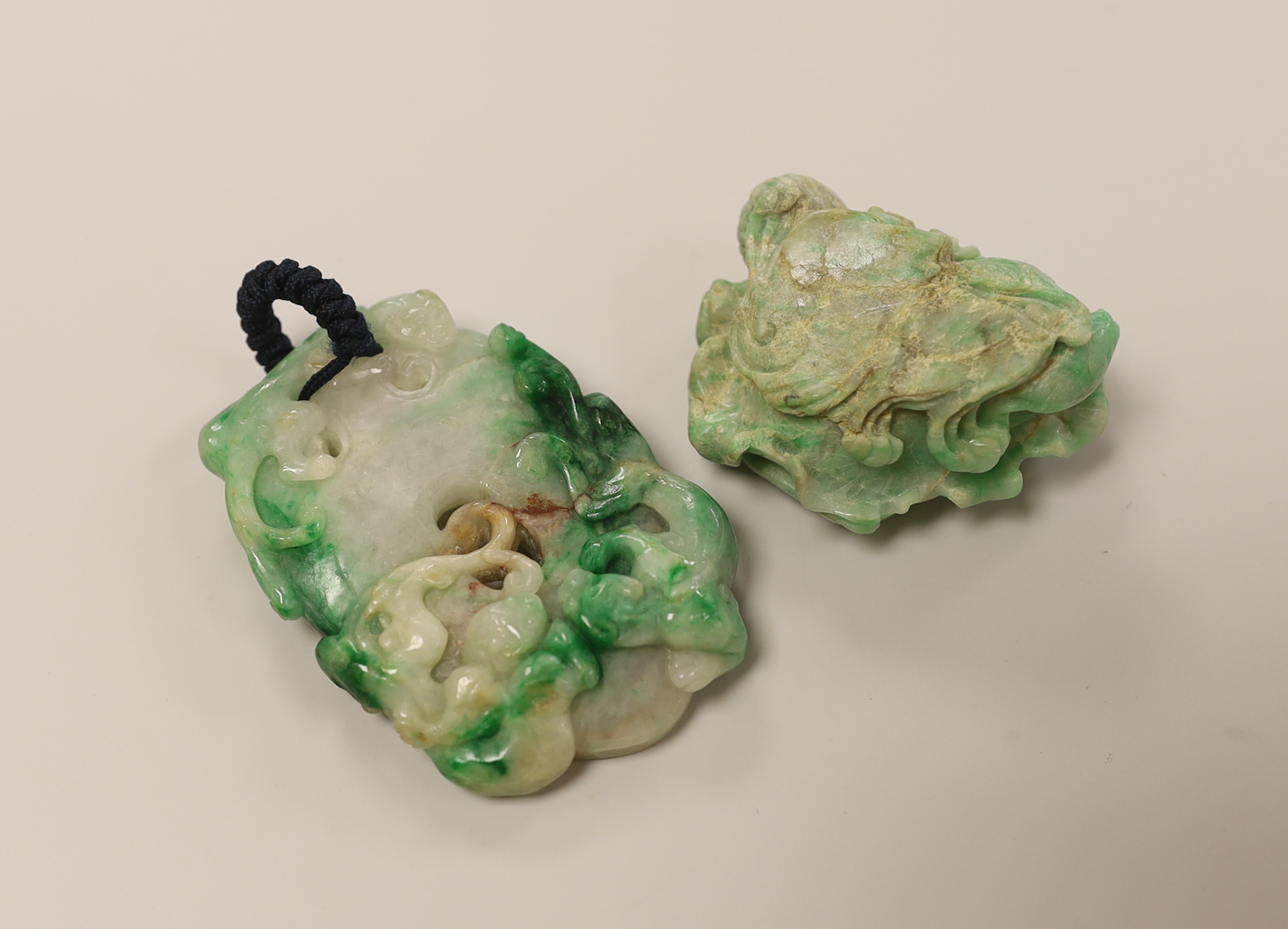 A 19th century Chinese jadeite 'chilong' pendant and a similar brushwasher pendant 7cm long